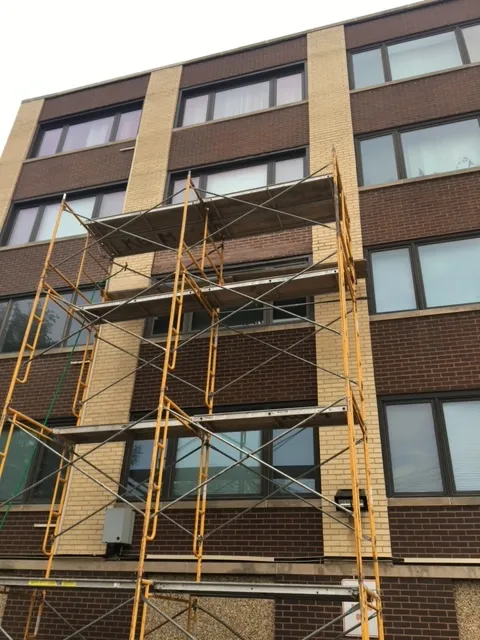 lintel repair using scaffolding on apartment building