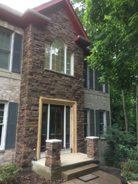 the end result of stone veneer installation by masonry contractors